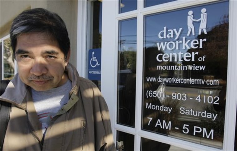 In this photo taken Tuesday, Feb. 1, 2011, job seeker Rolando Cunanan leaves the Day Worker Center of Mountain View without work in Mountain View, Calif. The number of people applying for unemployment benefits plunged last week to the lowest level in nearly three years. 